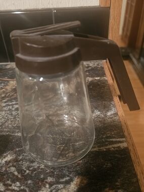Glass Syrup Dispenser with Dark Brown Lid and Pour Spout